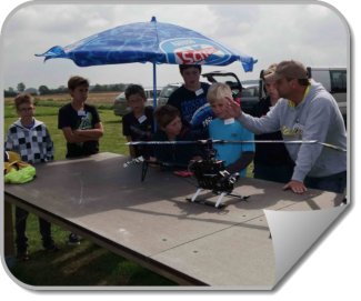 Harry beim Erklären der Flugphysik eines Helis